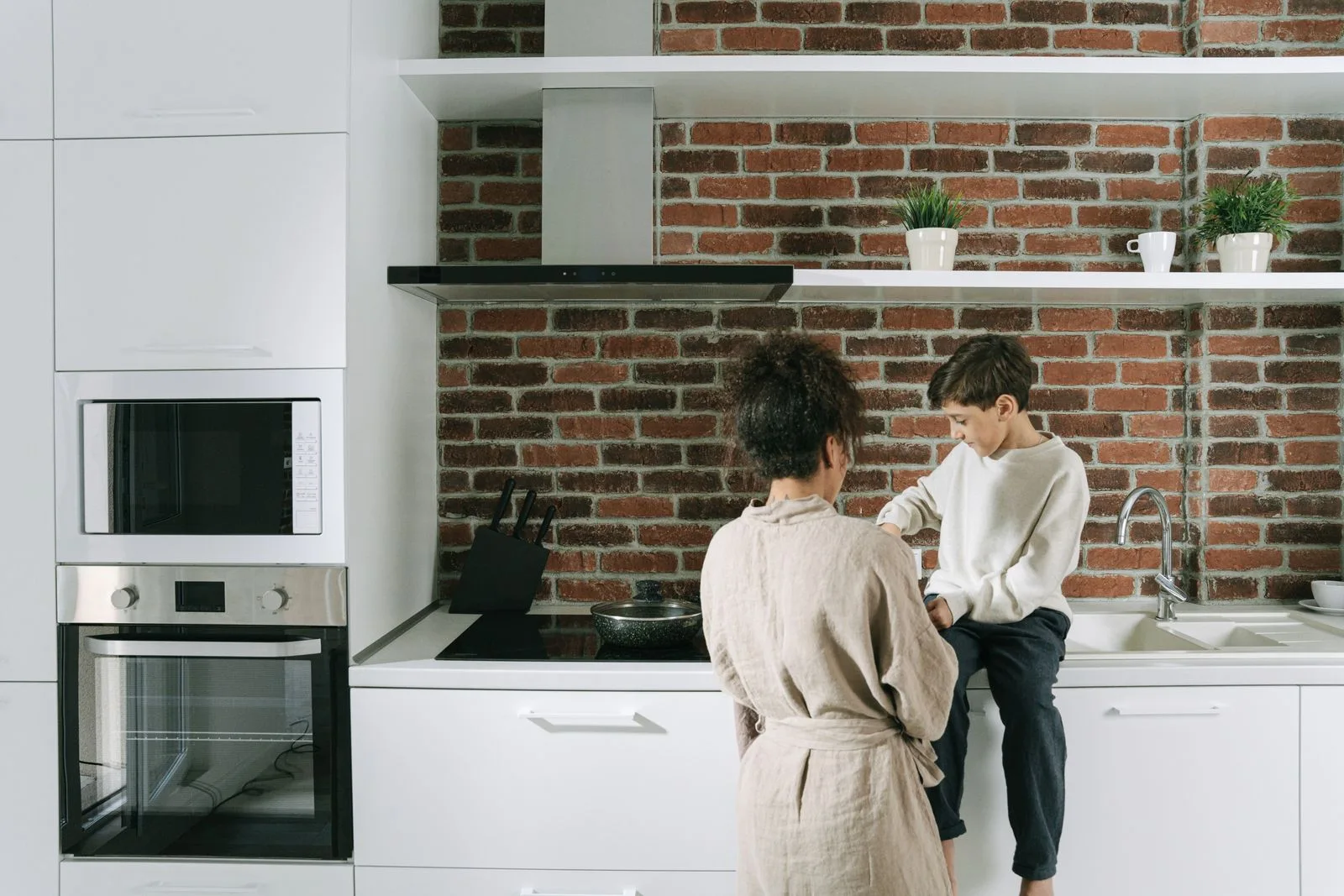Mother and child in a bright kitchen