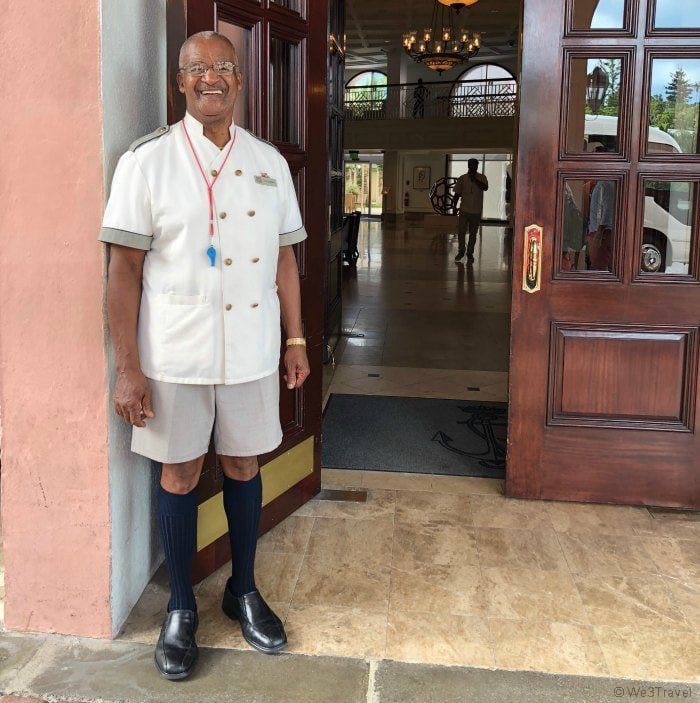 Doorman in Bermuda shorts
