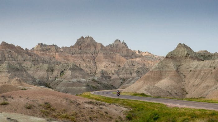 Badlands national park road with motorcycle