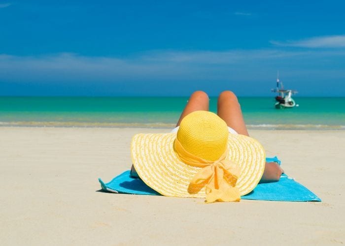Floppy sun hat on the beach
