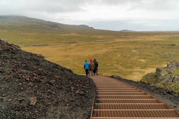 Climbing down the stairs at Saxholl Crater