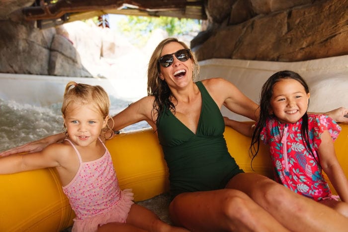 woman and two girls in a raft at Typhoon Lagoon