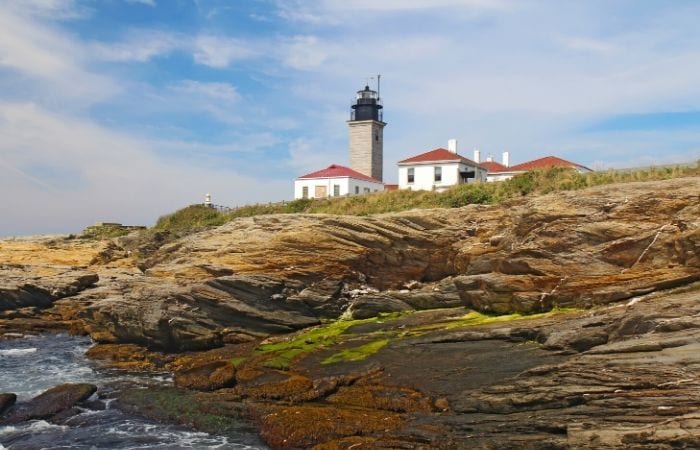 lighthouse from the rocks at Beavertail State Park