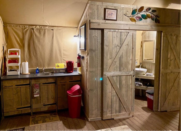 KOA glamping tent kitchen area with sink and coffee maker