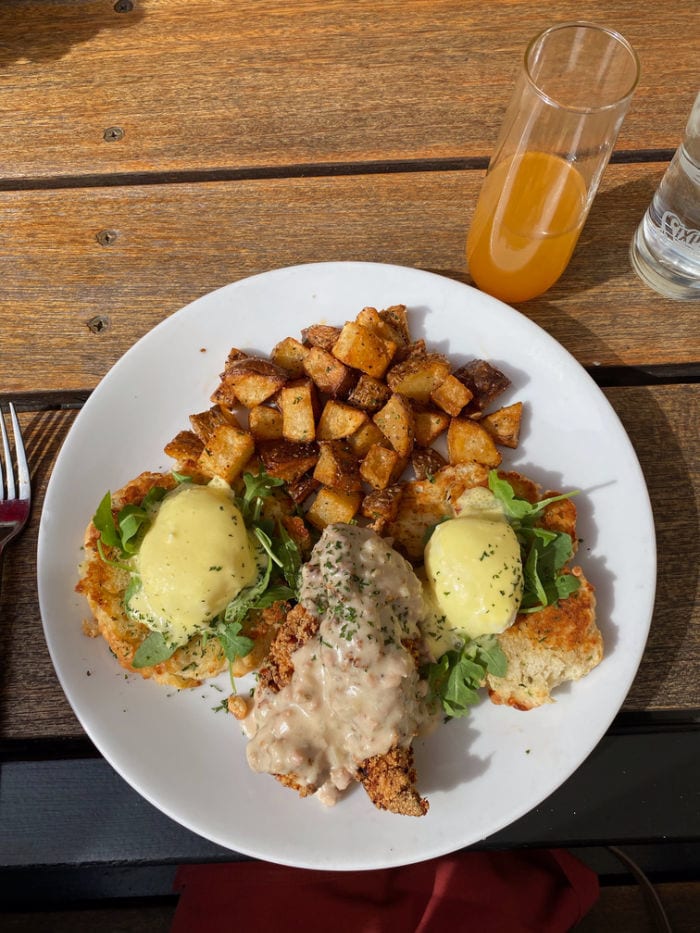 Chicken and biscuit benedict and bellini at Rogue Island