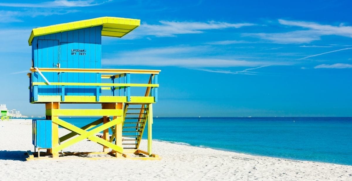 Blue and yellow lifeguard stand on Miami Beach