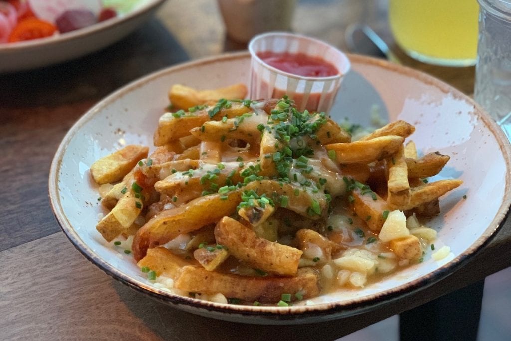 Poutine fries and ketchup from Duckfat in Portland Maine