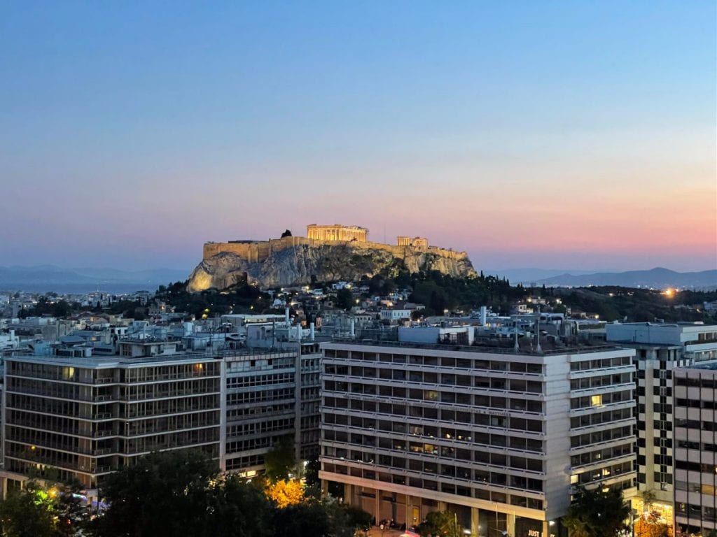 View of the Acropolis and buildings at sunset from the Grand Hotel Bretagne