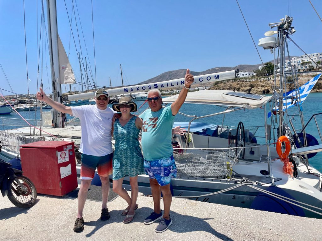 Tamara, Glenn and Captain George in front of Naxos Sailing yacht Annabella