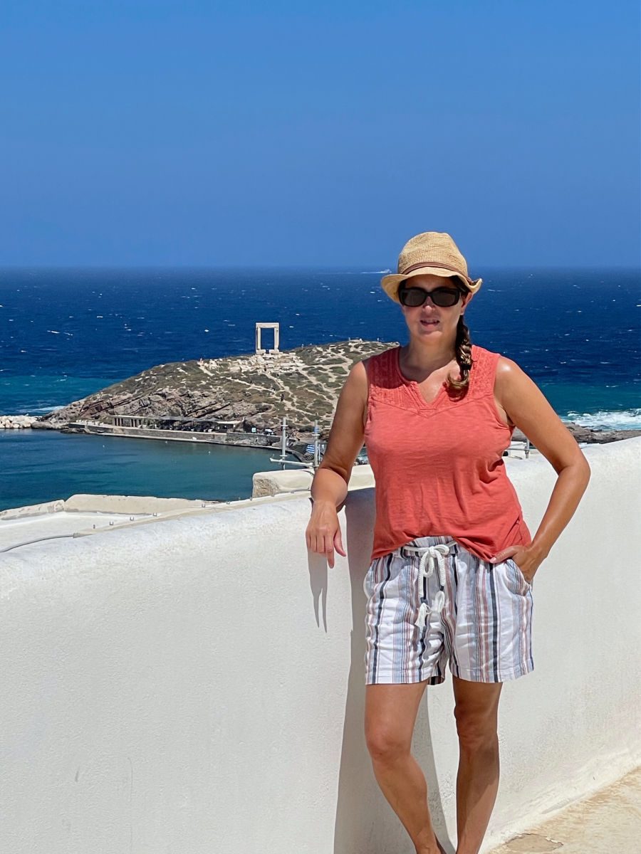 Tamara standing on balcony overlooking Apollo temple
