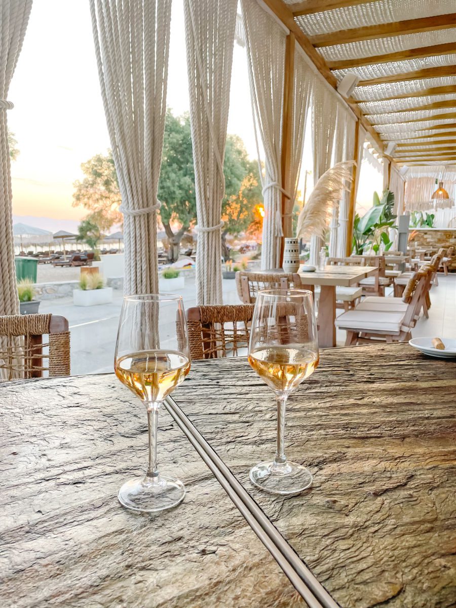 Two wine glasses on table at Virtu Suites restaurant