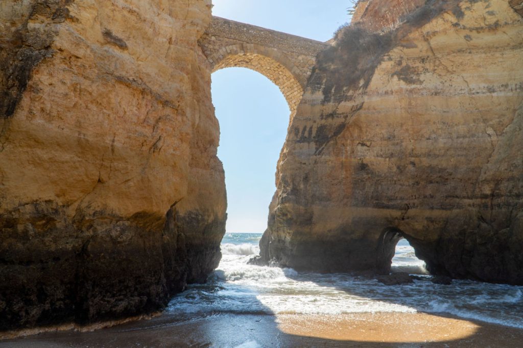 Roman bridge and rock cliffs in Lagos