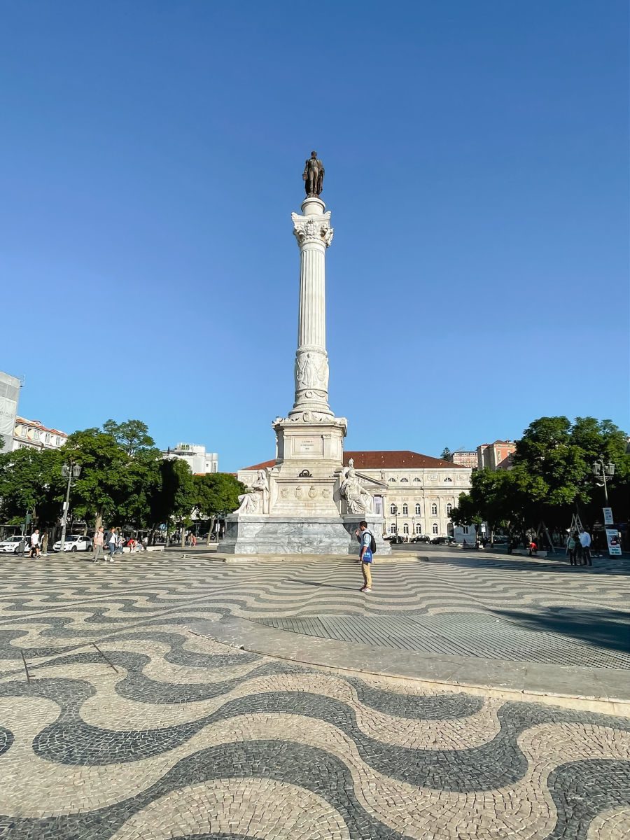 Black and white tile and statue in Rossio Square, Lisbon