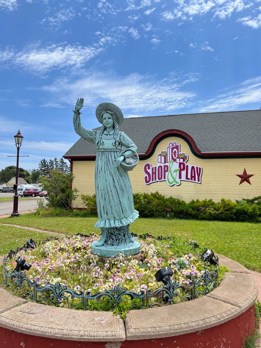 Anne of Green Gables statue outside of the Shop & Play store in Gateway Village