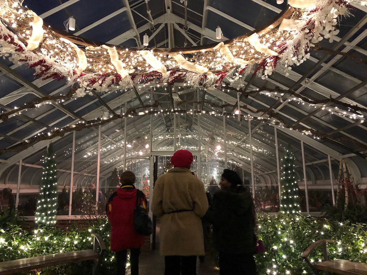 3 women standing in the Longwood Gardens conservatory