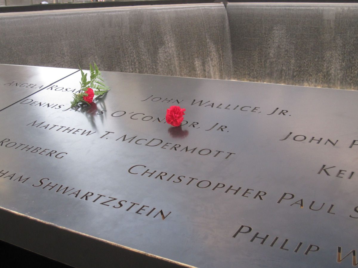 Names and red carnations at the 9/11 Memorial