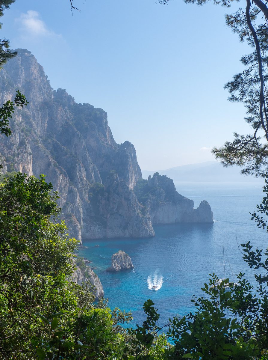 View of cliffs and boat in the water