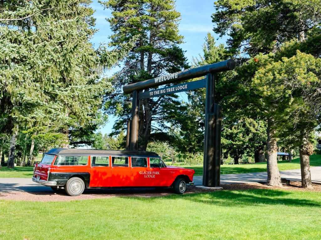 Glacier Park Lodge entrance and red car