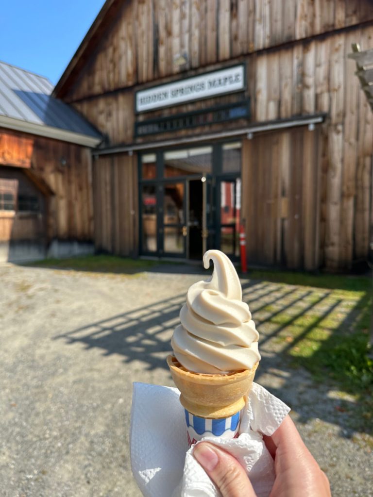 Maple creamee in front of Hidden Springs Maple