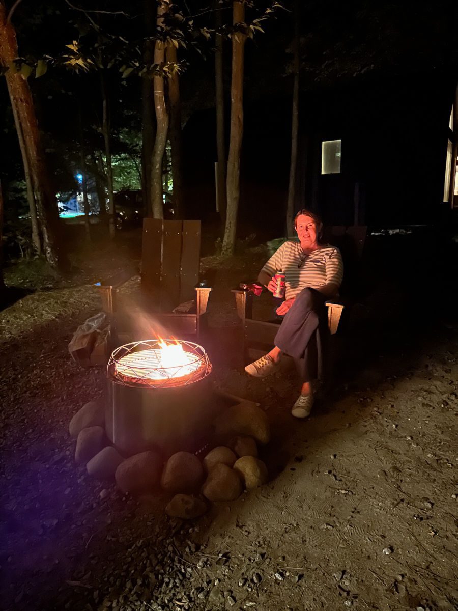 Lumen Nature Retreat fire pit at night