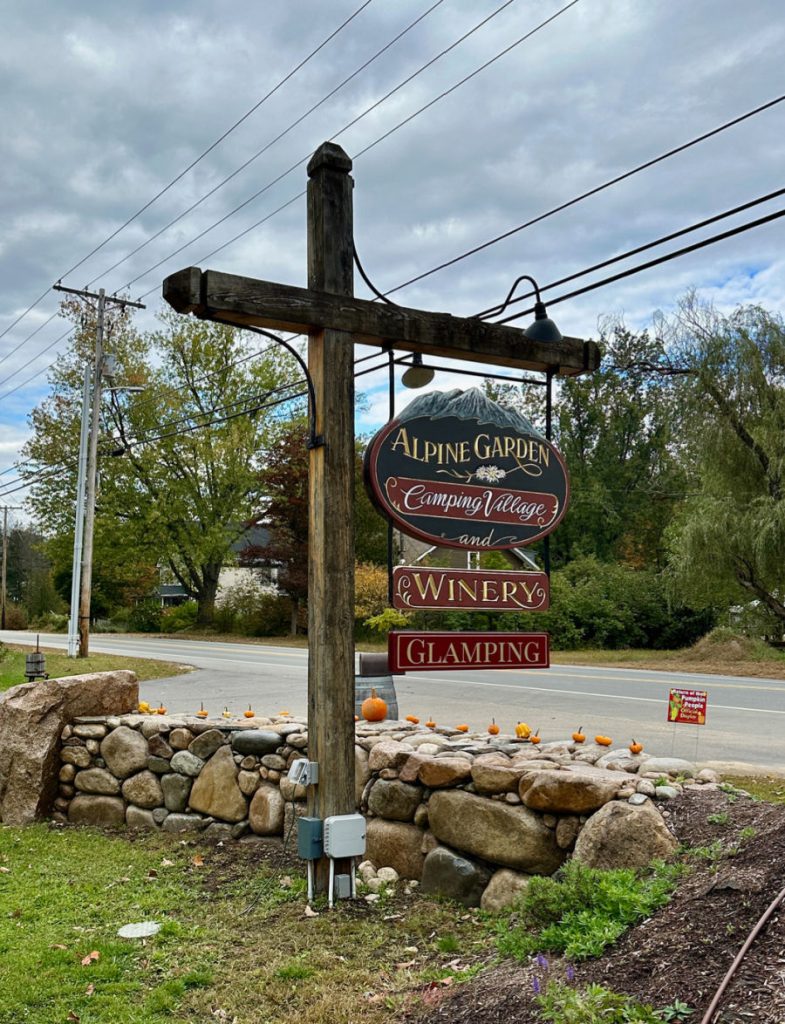 Alpine Garden Glamping sign
