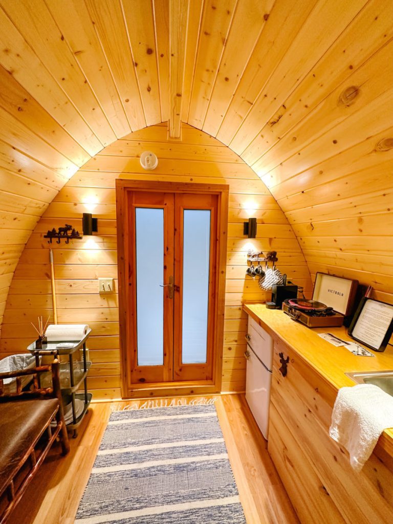 Inside the hobbit house at Alpine Garden Glamping