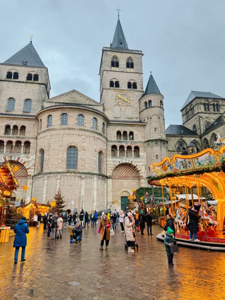 Trier Cathedral with carousel in front