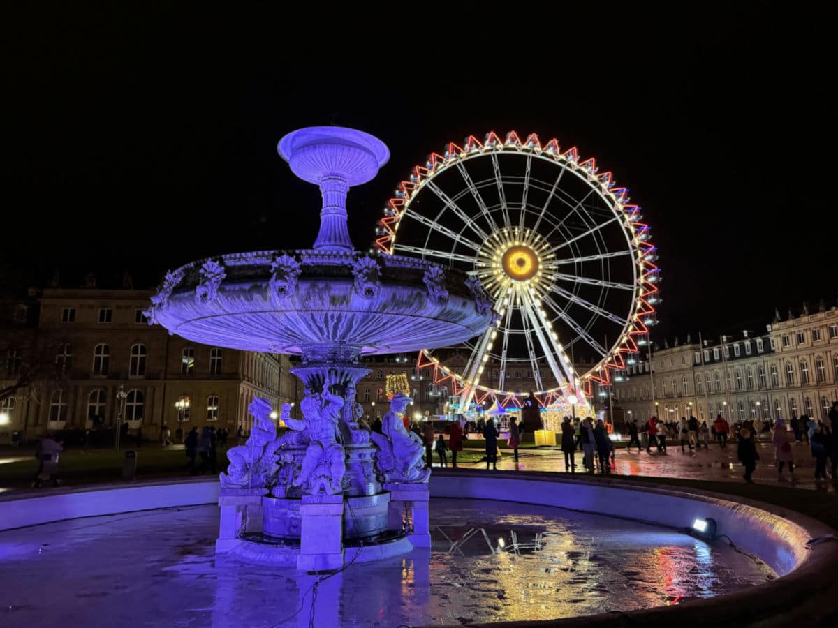 Stuttgart Christmas Markets - Ferris wheel and fountain in Schlossplatz