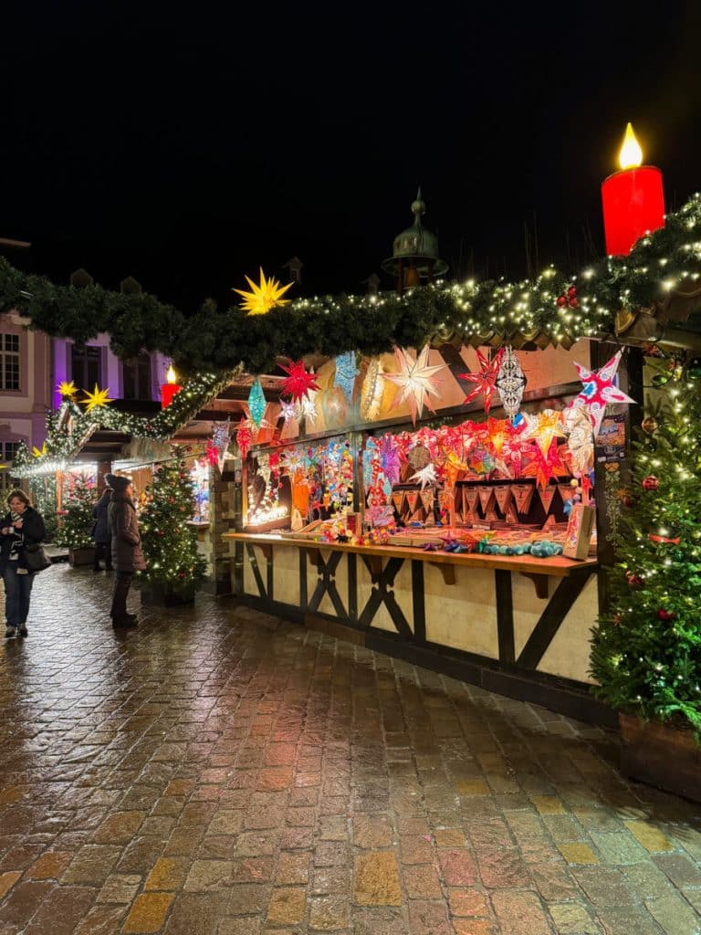 christmas market stand selling stars