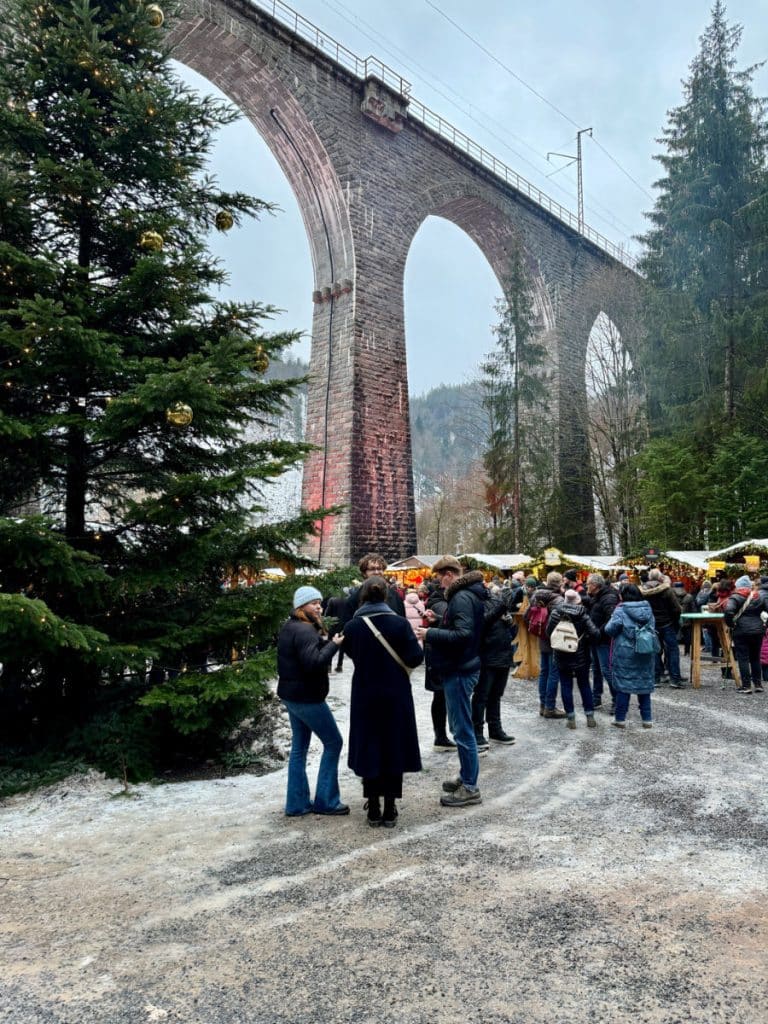 aqueduct during the day with people below