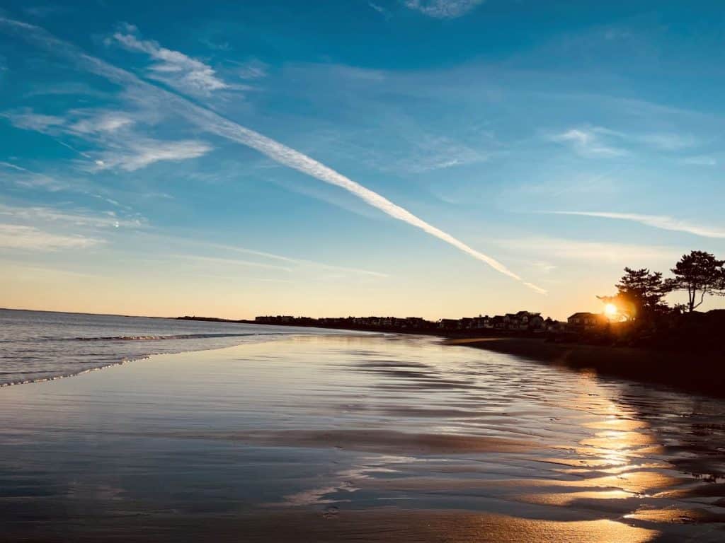 View of sunset over low tide at the beach