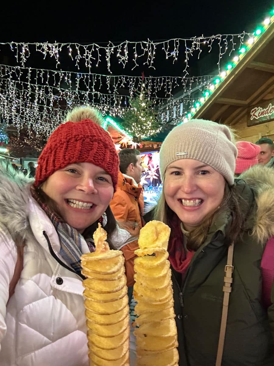 Tamara and Amanda holding a potato tornado