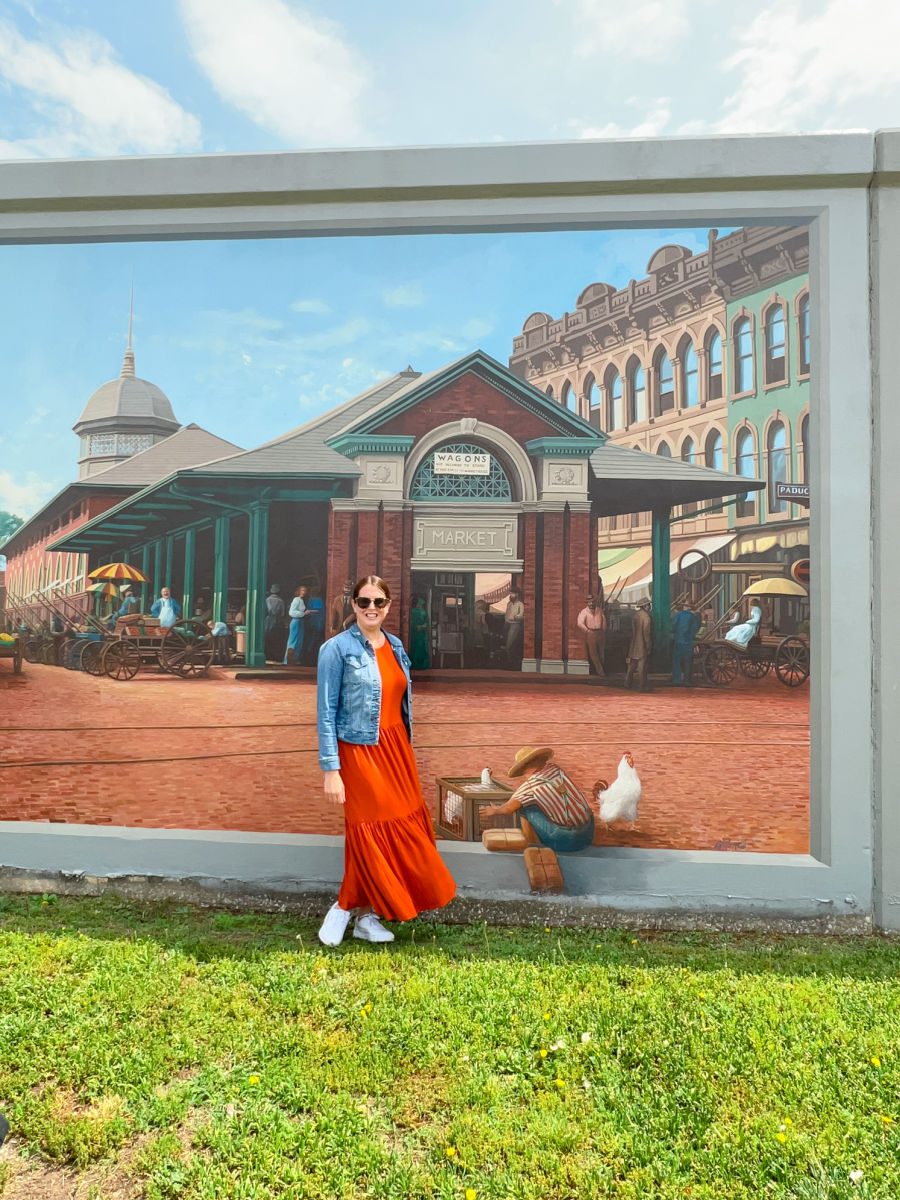 Tamara in font of Wall to Wall Murals