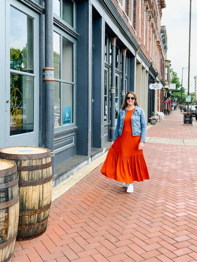 Tamara walking on brick sidewalk in Paducah