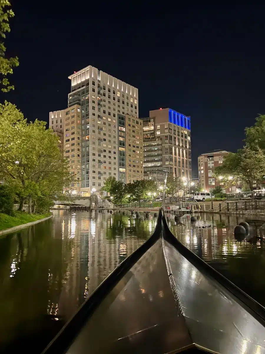 Tip of gondola on providence river at night