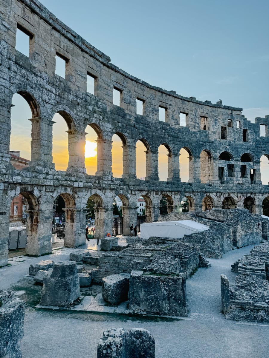 Inside the Pula Arena at sunset