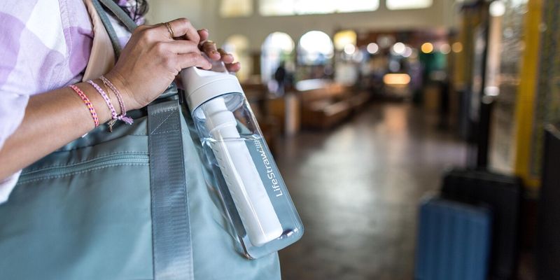 Bring a Refillable Water Bottle with Filter