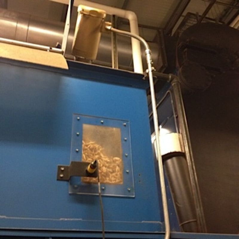 Warming Winter Harvests: The Biomass Heating System