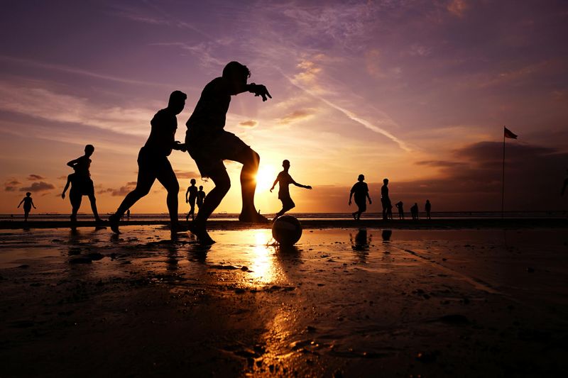 Beach Soccer Matches at Sunset