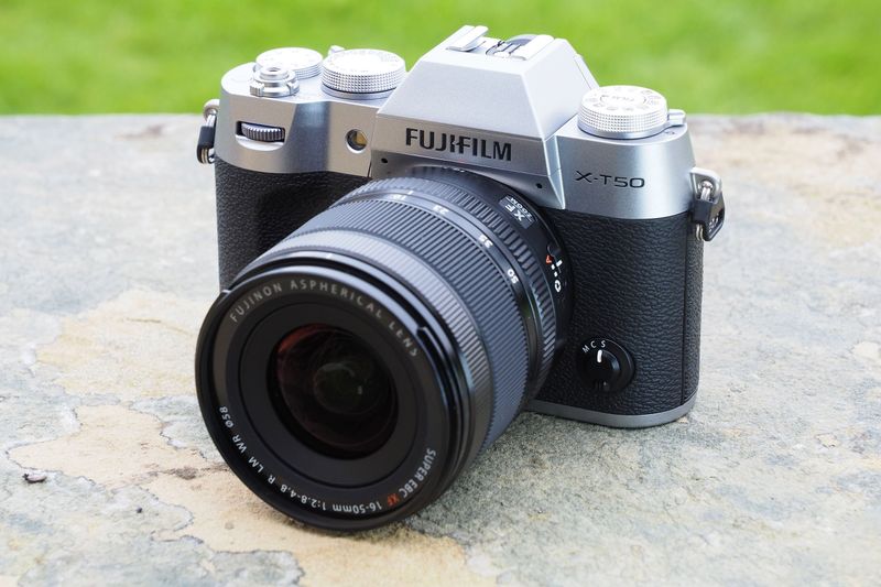 Fujifilm X-T50 (APS-C) — travel-friendly with IBIS + film simulations