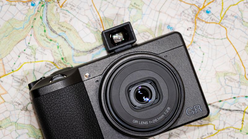 Ricoh GR IIIx (compact, APS-C) — ~262 g (with battery/card)