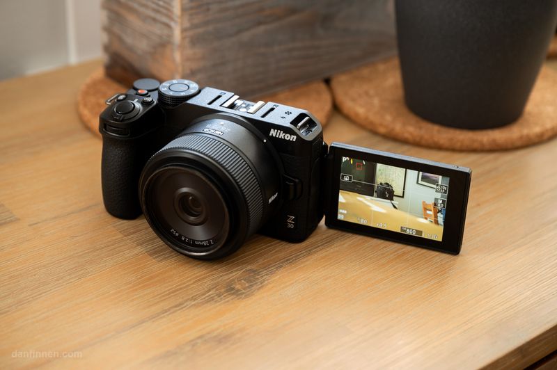 Nikon Z30 (mirrorless, APS-C) — ~350 g (body)
