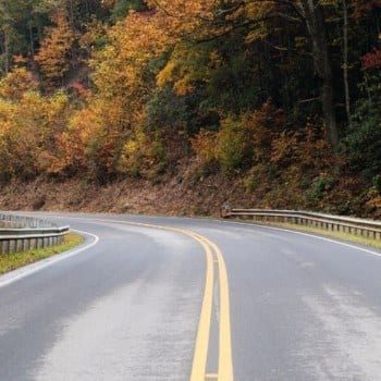 road through mountains in the fall