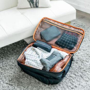 Why Travelers Should Avoid Packing Shoes In Luggage (And The Space-Saving Spot To Put Them Instead)