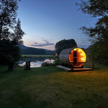 Lumen Nature Retreat Nordic sauna by the pond at night