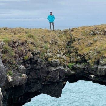 Tamara on the Arnarstapi cliffs land bridge